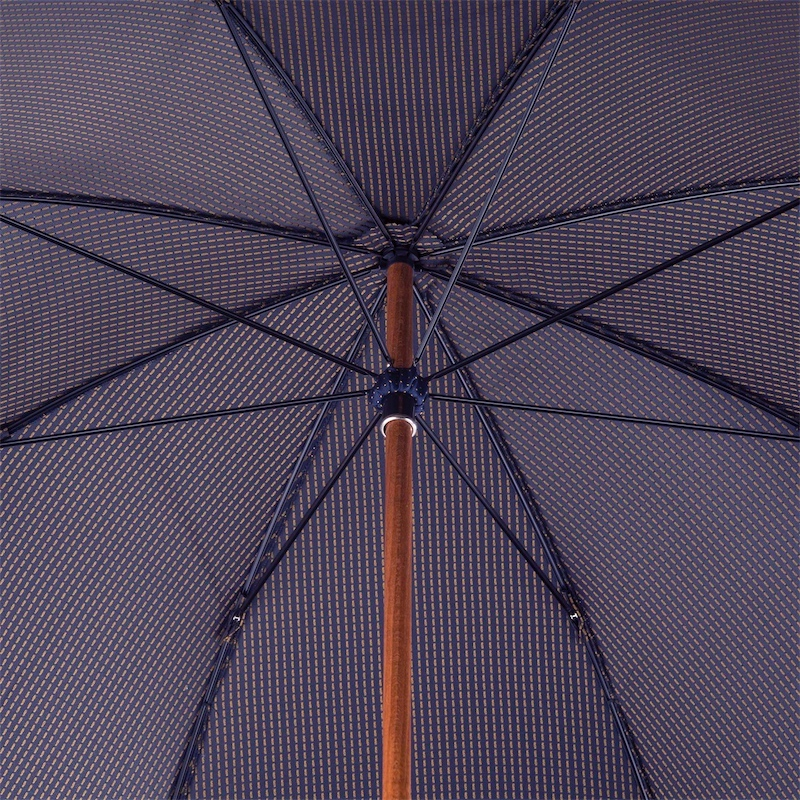 Men's navy umbrella with yellow polka dots featuring a handmade Italian leather handle by Pasotti.