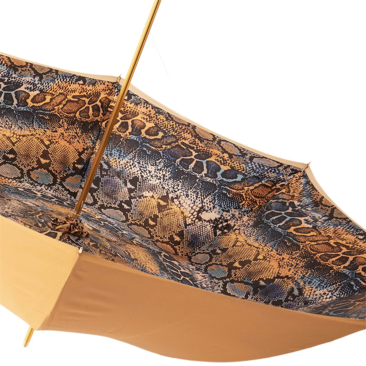 Snake print luxury rain umbrella with sculpted brass handle, featuring a stylish design and sturdy construction.