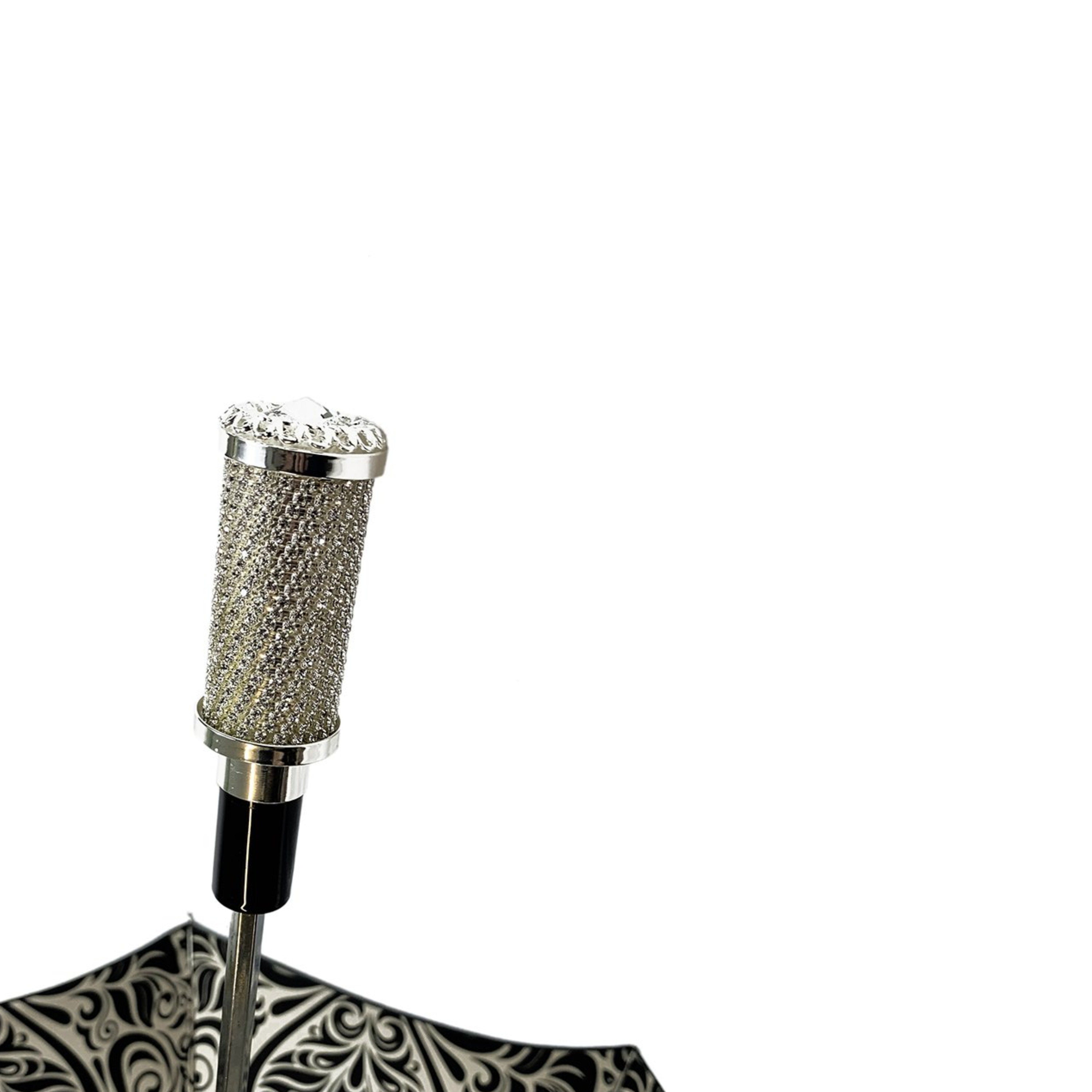 Black and white Ilmarchesato folding umbrella with luxury damask pattern and silver-plated handle, open to show elegant design.