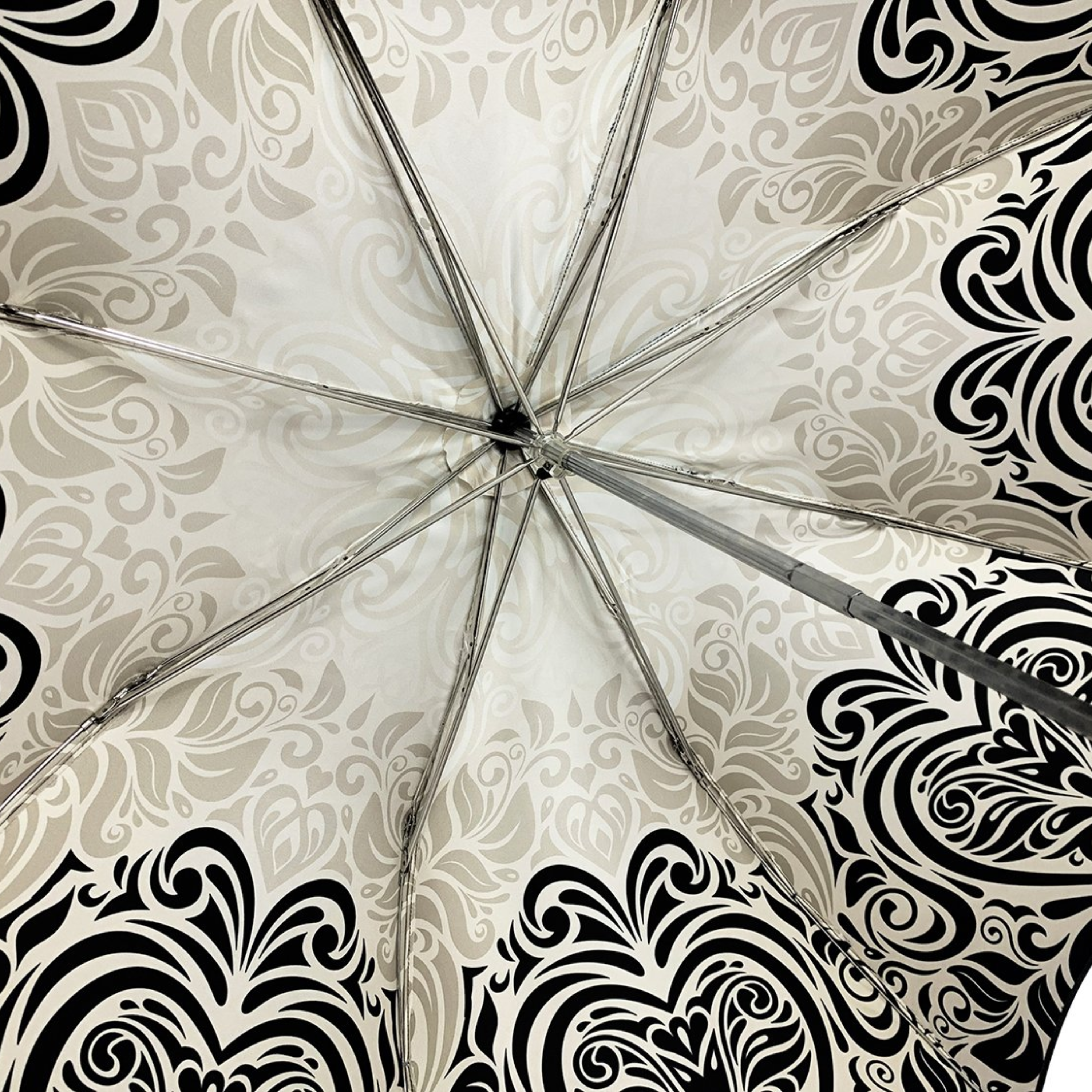 Black and white Ilmarchesato folding umbrella with luxury damask pattern and silver-plated handle, stylish rain protection.