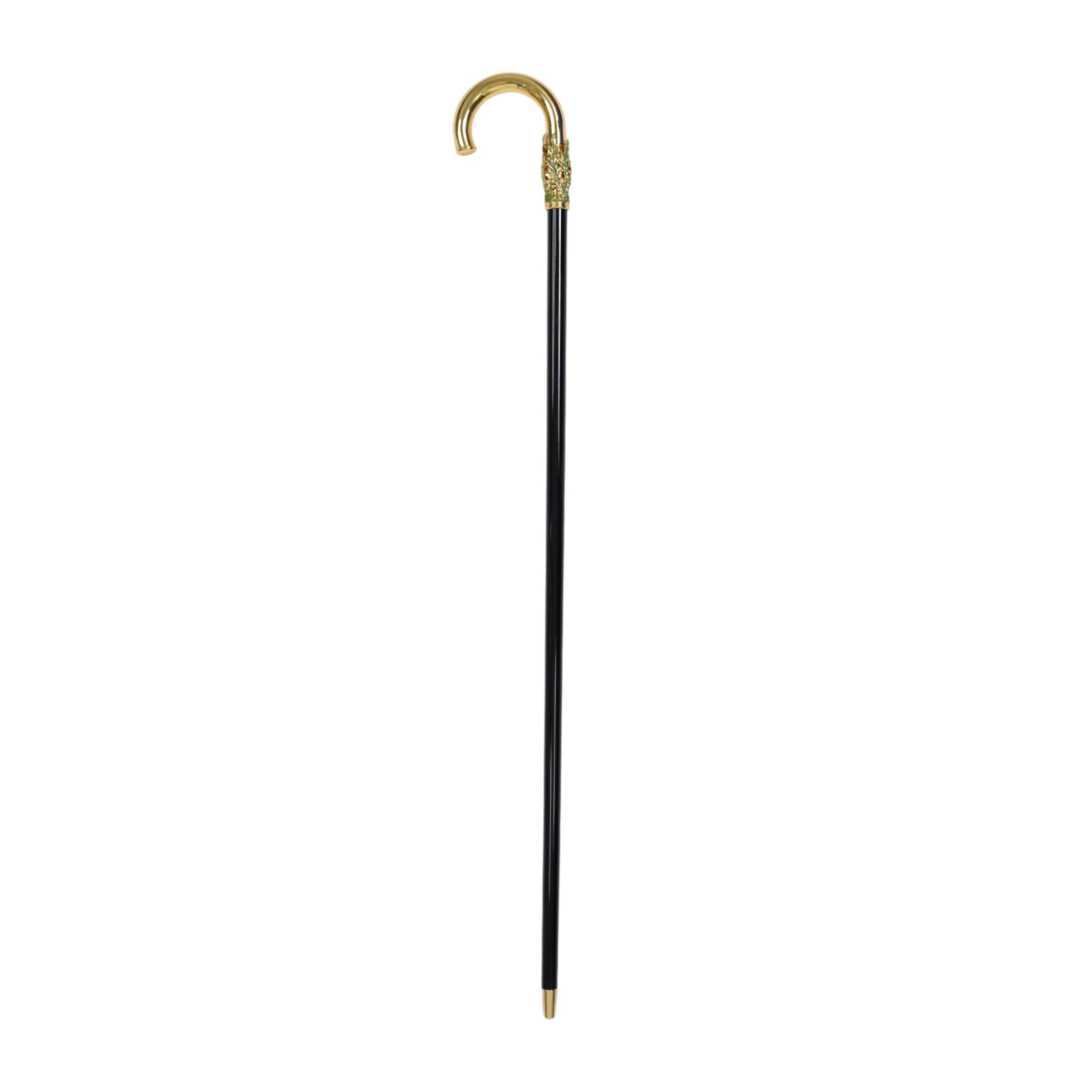 Handcrafted 24K gold walking cane with leaf handle by Ilmarchesato, featuring elegant Italian artisan craftsmanship.