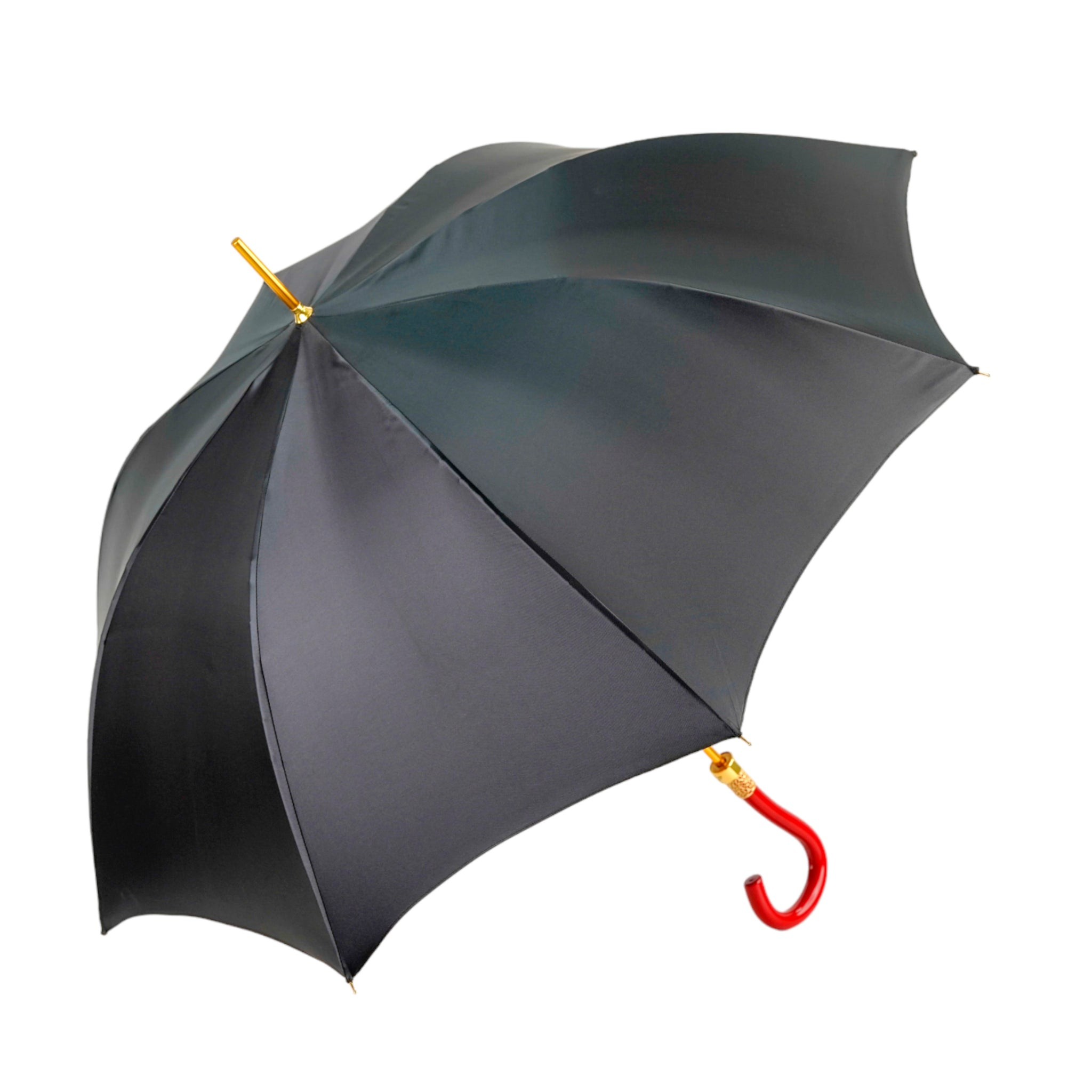 Black and red couture rain umbrella with gold filigree handle, stylish and elegant for rainy weather.