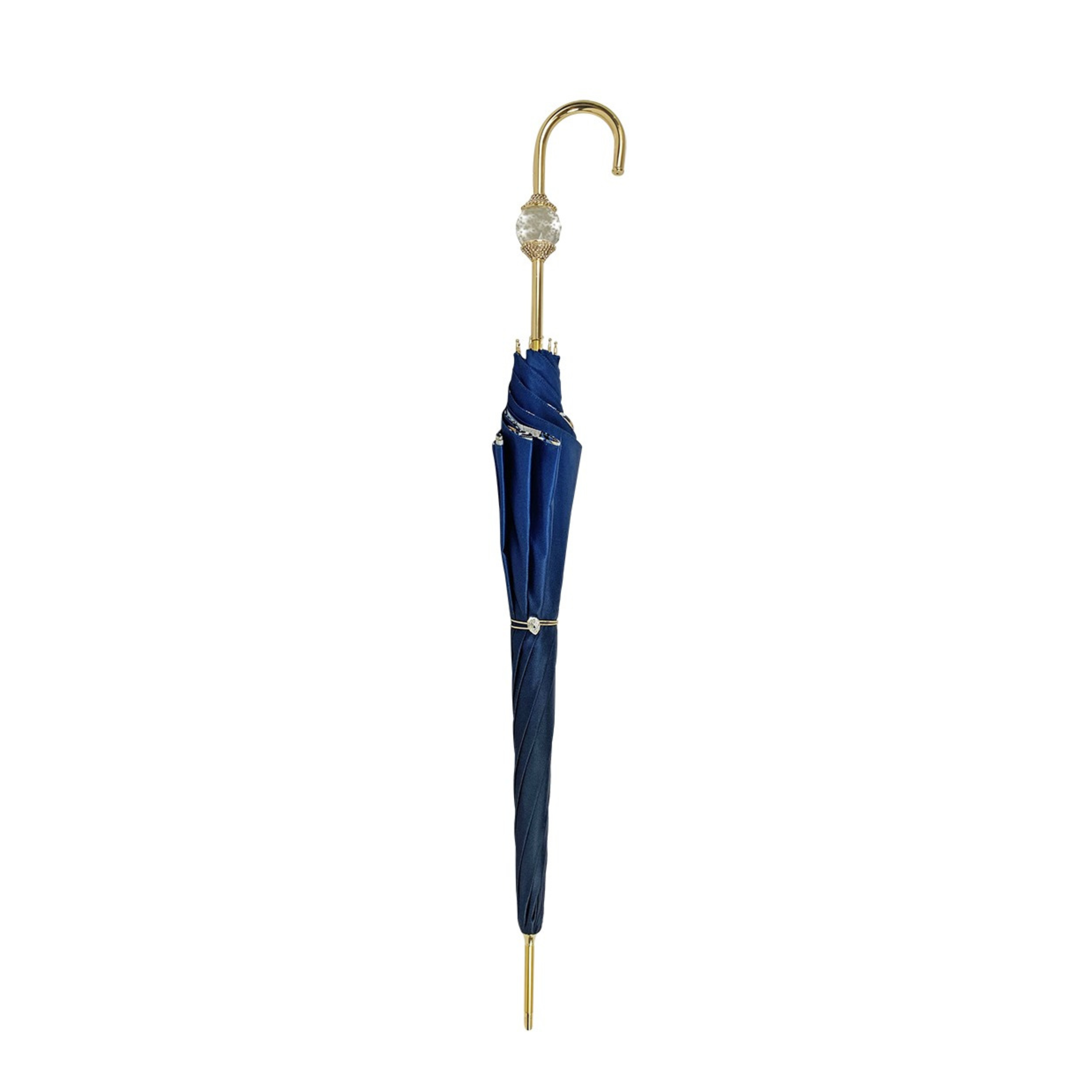 Navy blue luxury umbrella by Ilmarchesato featuring a Swarovski crystal sphere handle, open against a neutral background.