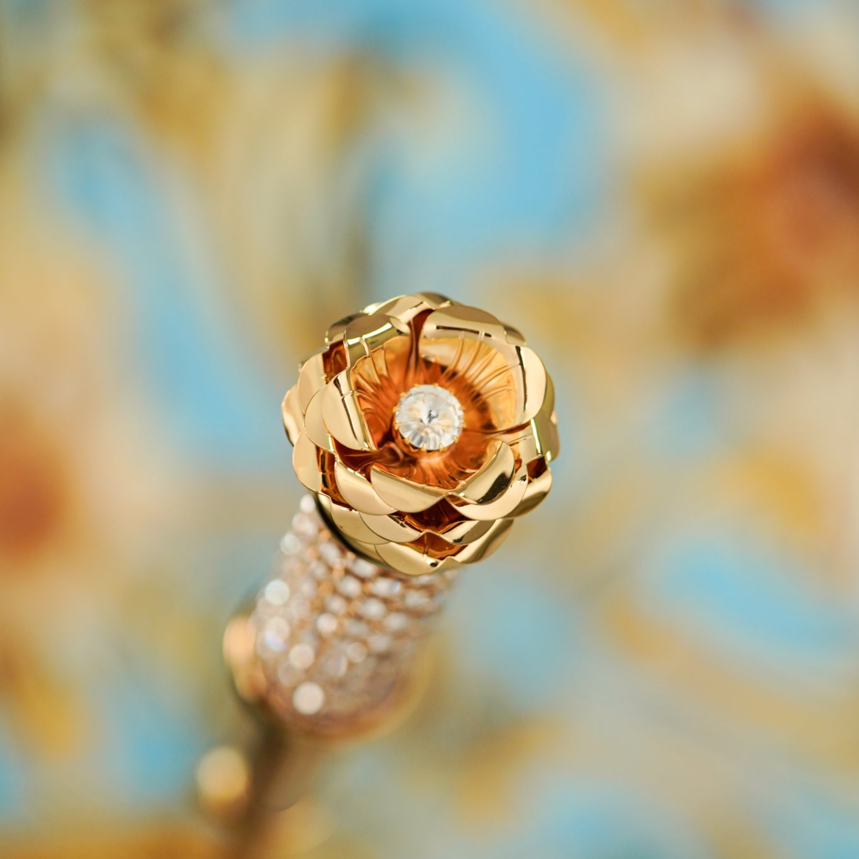 Royal Azure limited edition luxury umbrella by Ilmarchesato with intricate design and elegant handle against a neutral background.