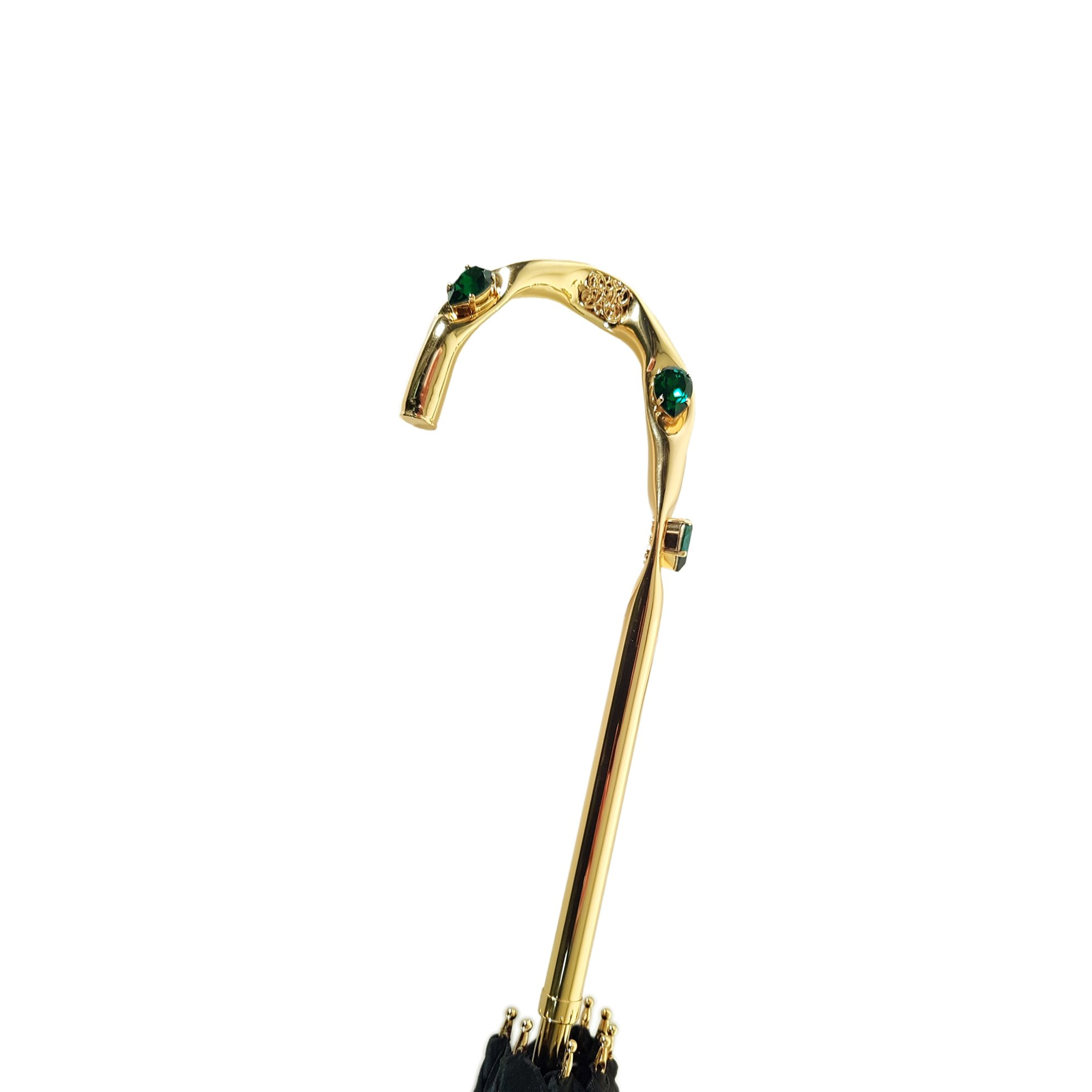 Luxury green double canopy umbrella by Ilmarchesato featuring a floral interior design, perfect for rainy days.