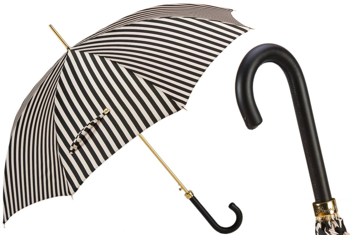 Handmade Italian black and white striped rain umbrella with leather handle by Pasotti, showcasing elegant craftsmanship and classic design.