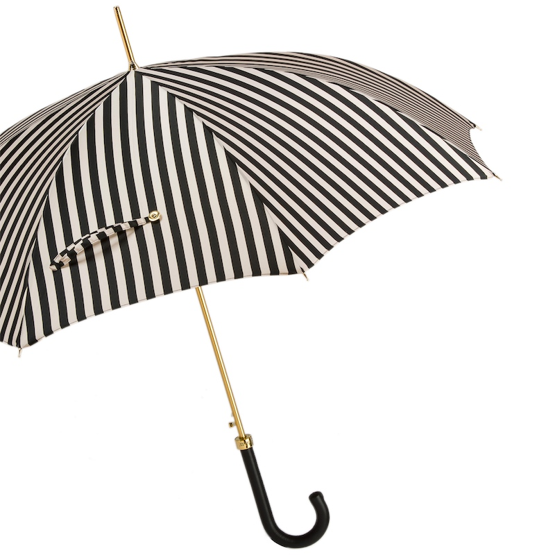 Handmade Italian black and white striped rain umbrella with leather handle by Pasotti, showcasing its stylish design and craftsmanship.