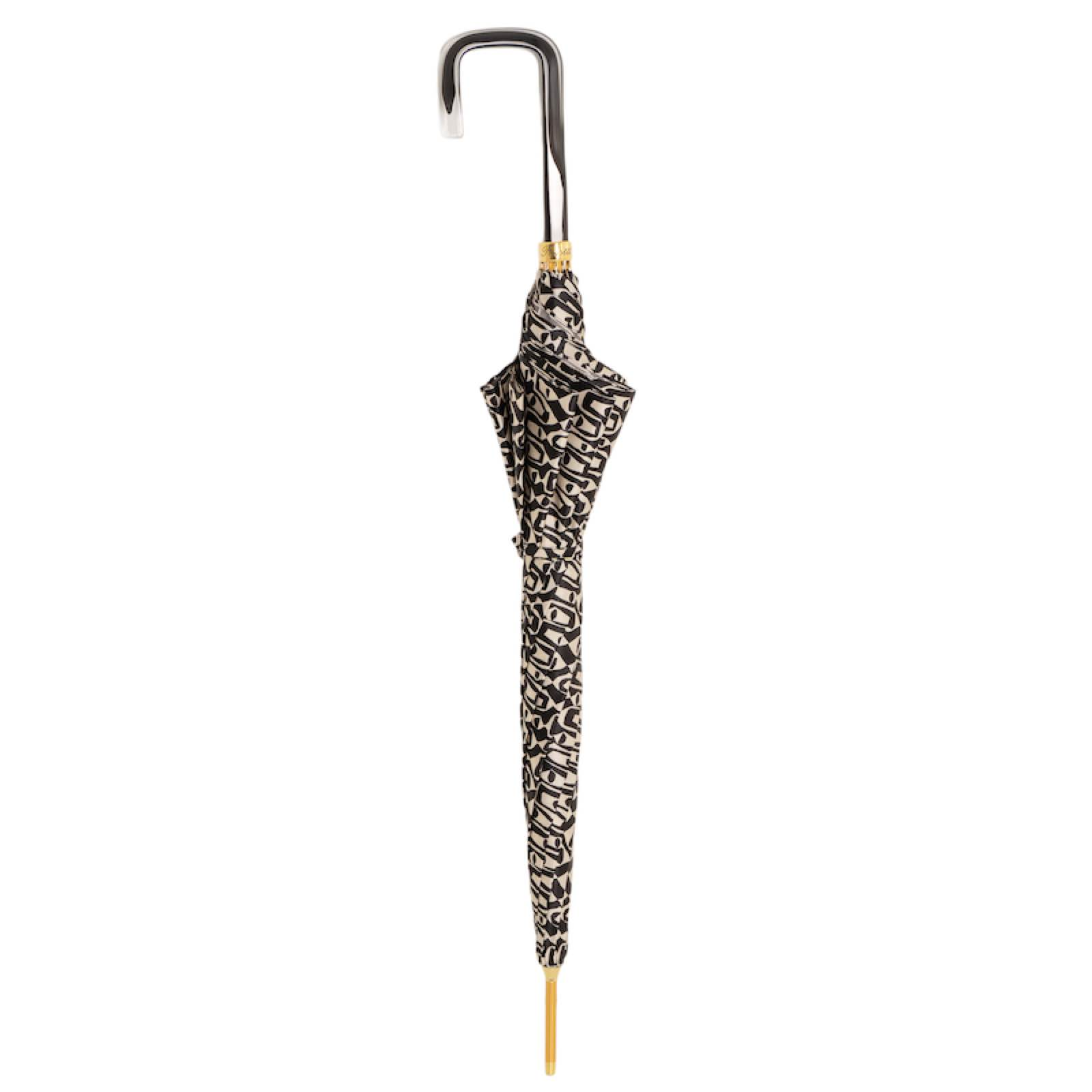 Pasotti acetate handle rain umbrella with automatic opening and handmade Italian mosaic design, featuring vibrant, intricate patterns.