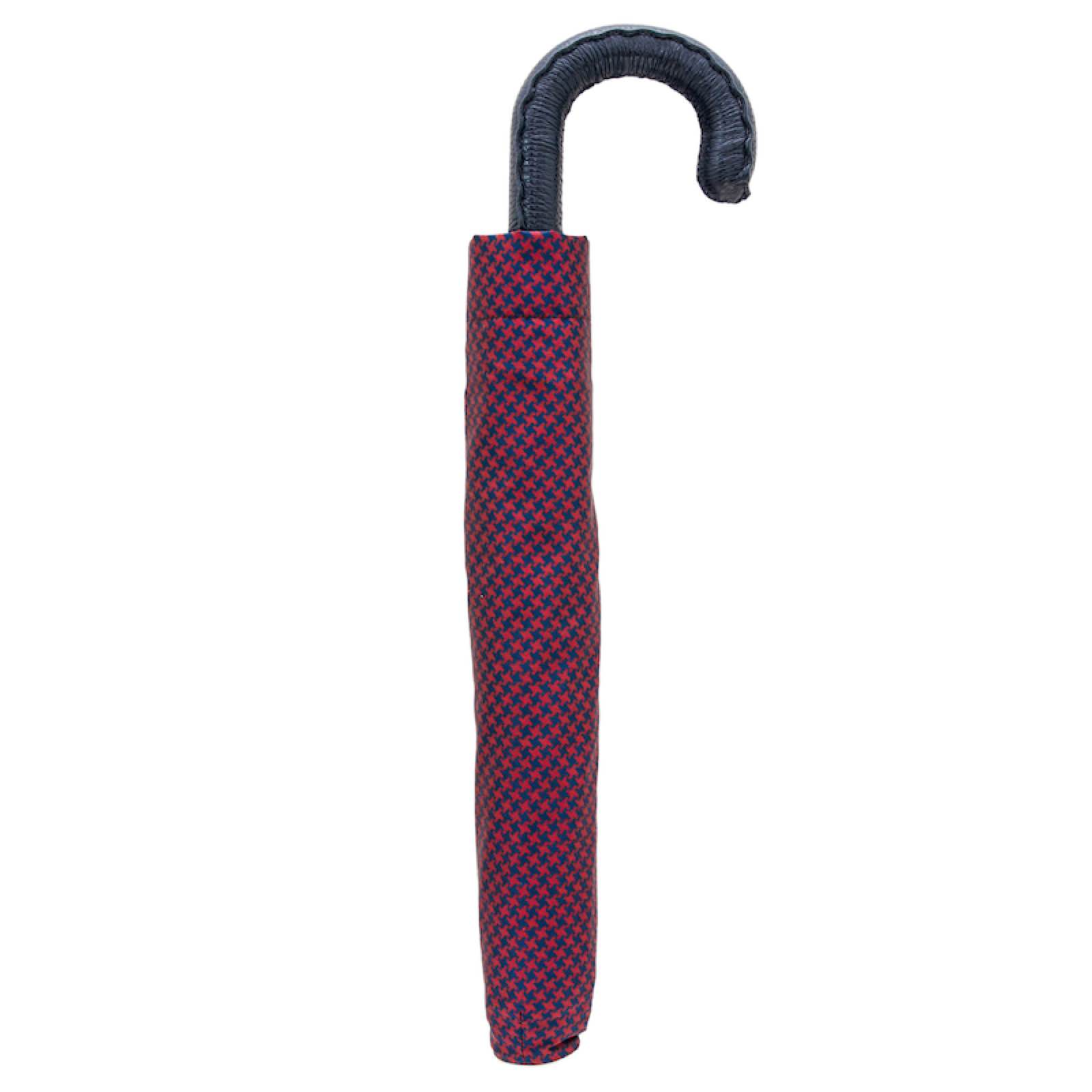 Folding Pasotti umbrella with Italian handmade leather handle, compact rain gear, black canopy, and automatic opening mechanism.