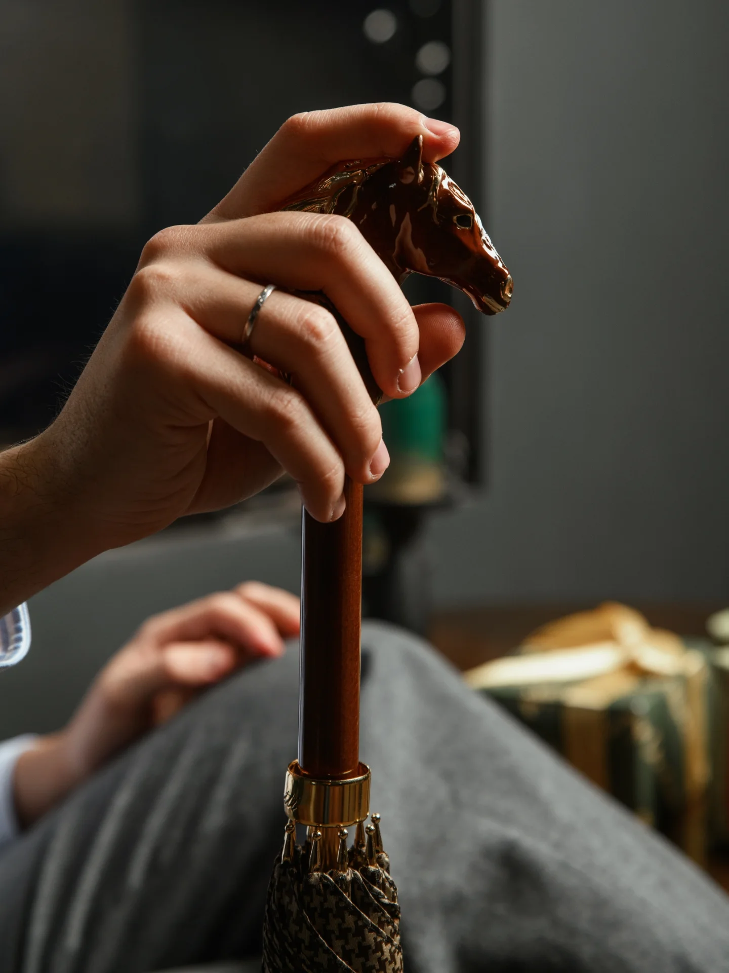 Handmade Pasotti luxury brown umbrella for men with modern horse design and automatic open feature.