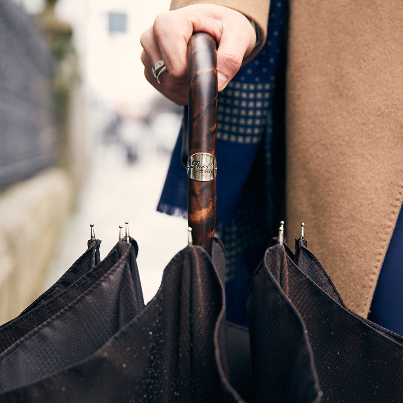 Handmade Italian solid stick umbrella with hickory wood shaft and horn handle, designed for men by Pasotti.