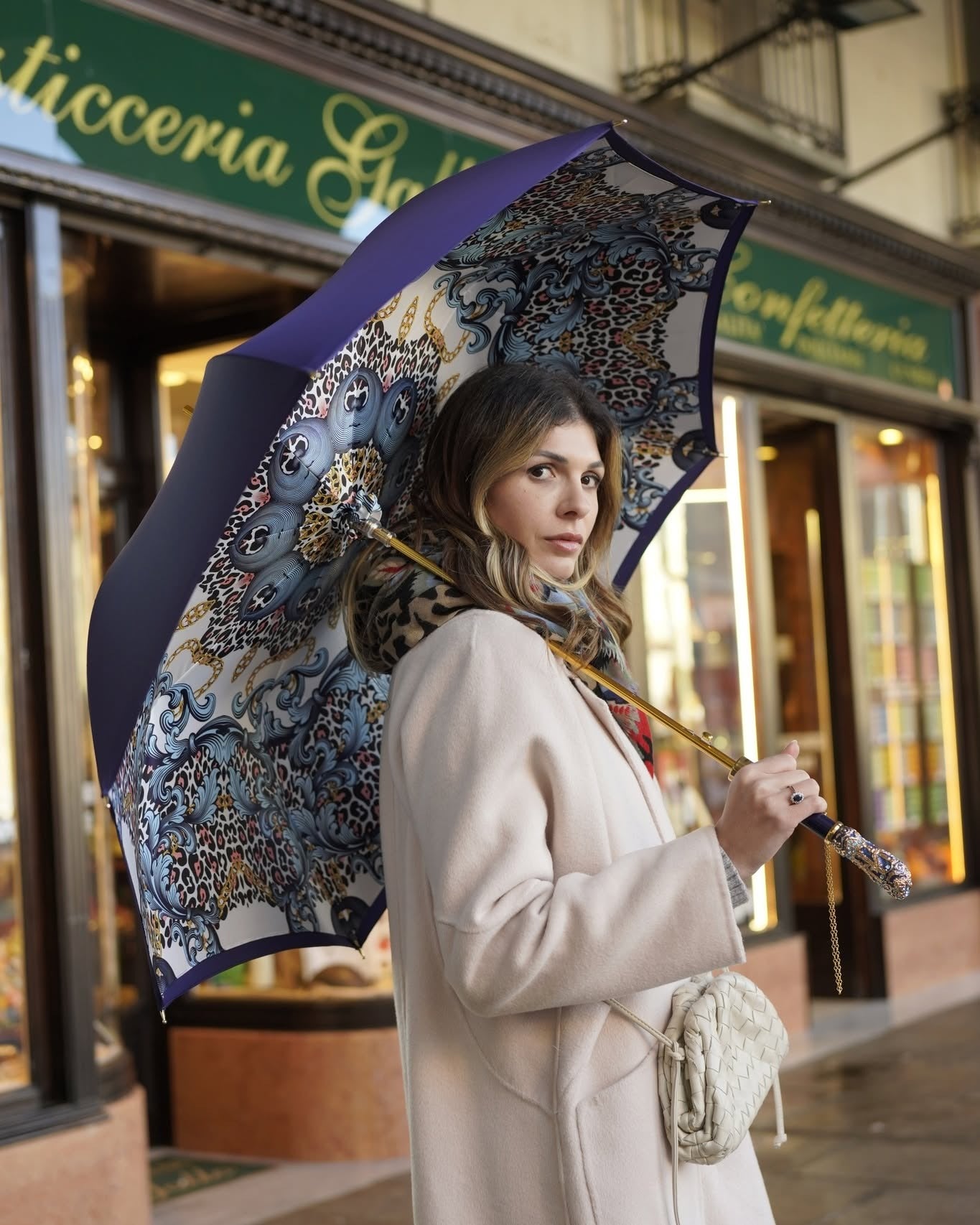 Luxury blue rain umbrella with handmade satin canopy and turquoise crystal handle by Ilmarchesato.