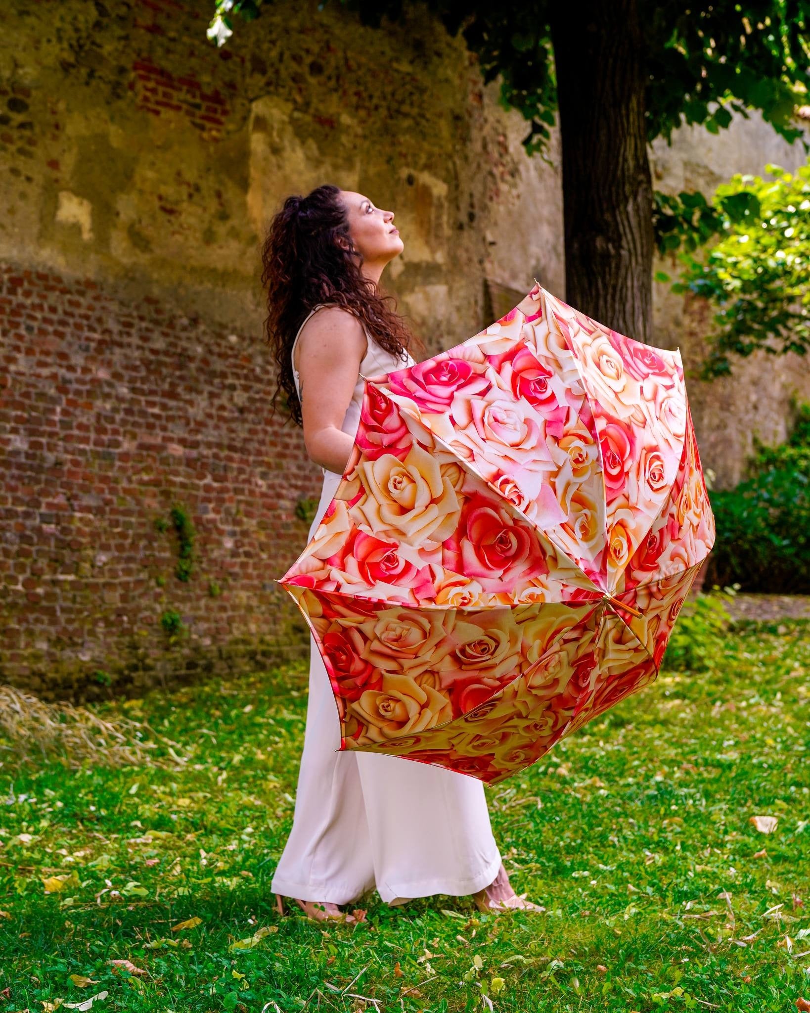Elegant women's rain umbrella by Ilmarchesato with a hand-painted rose handle, featuring a premium craft design.