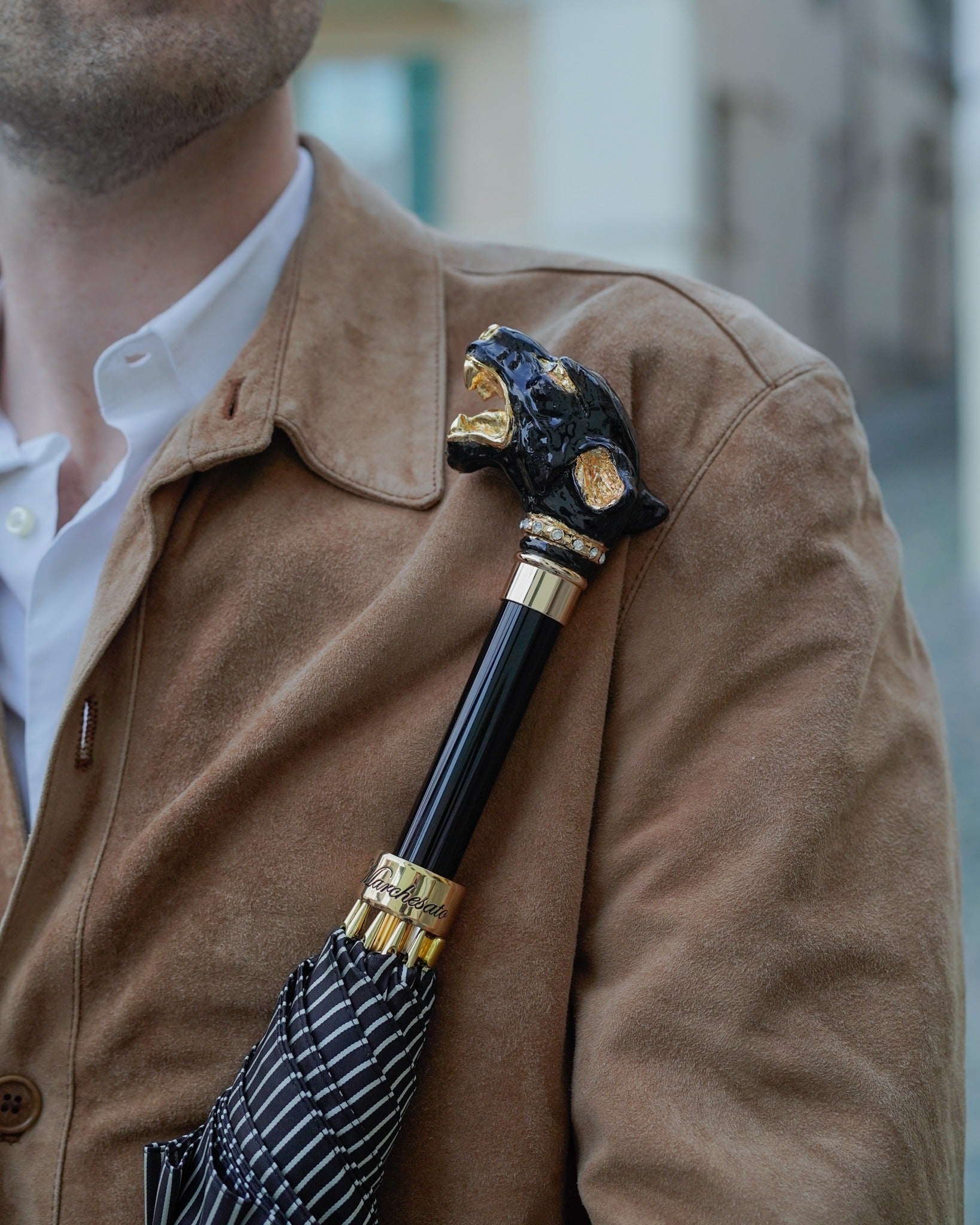 Italian men's enameled umbrella from Ilmarchesato, featuring a luxurious design with vibrant colors and a sturdy handle.