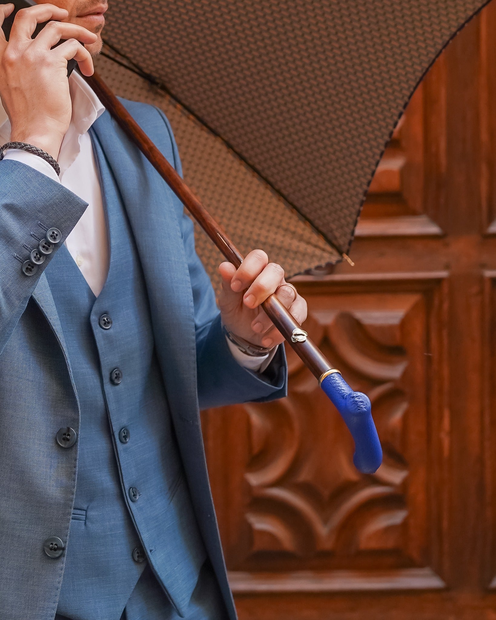 Blue leather handle designer umbrella for men with flamed beech wood shaft, luxury rain gear by Ilmarchesato