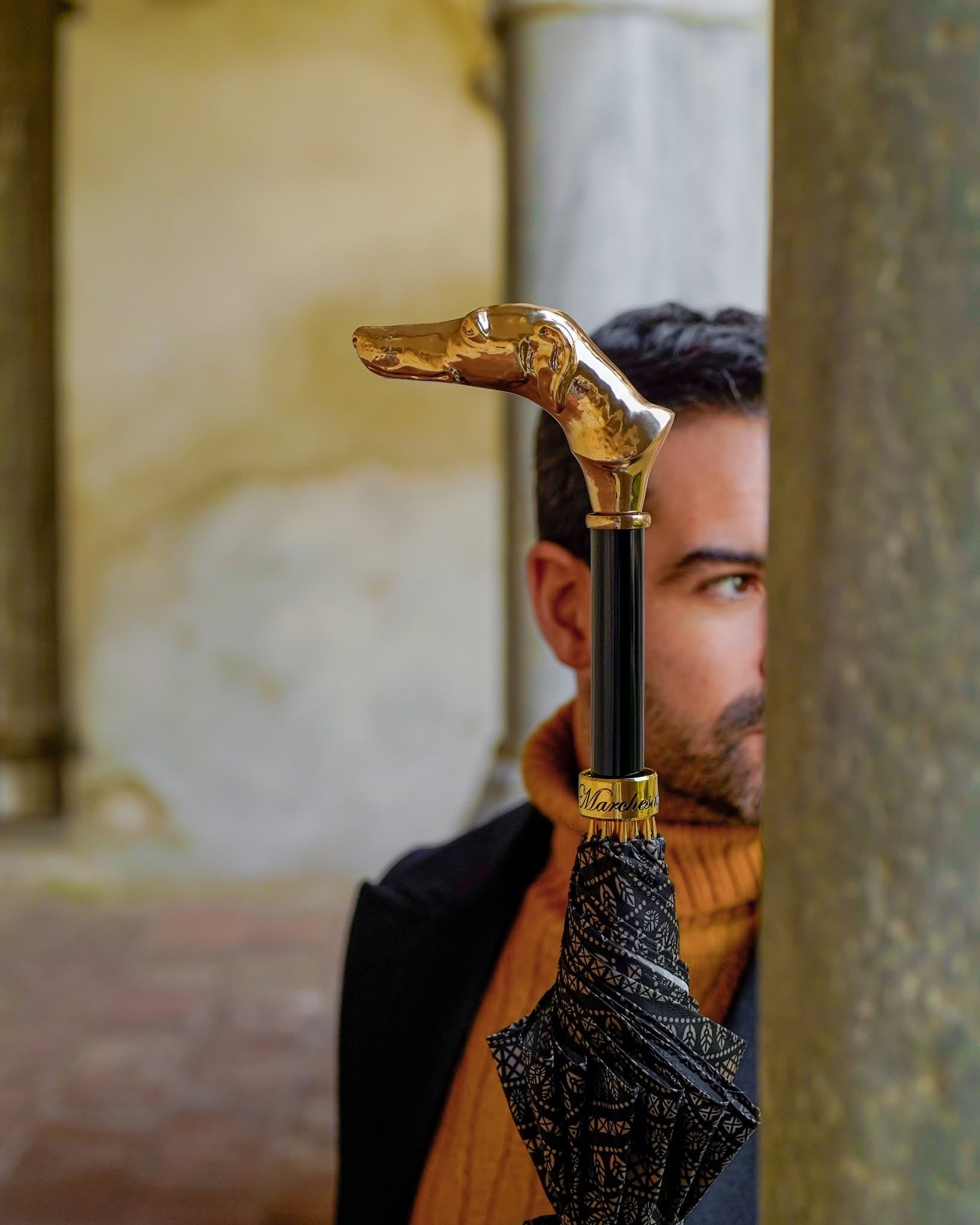 Men's Ilmarchesato umbrella with a gold-plated greyhound handle and decorative design, featuring a stylish, elegant canopy.