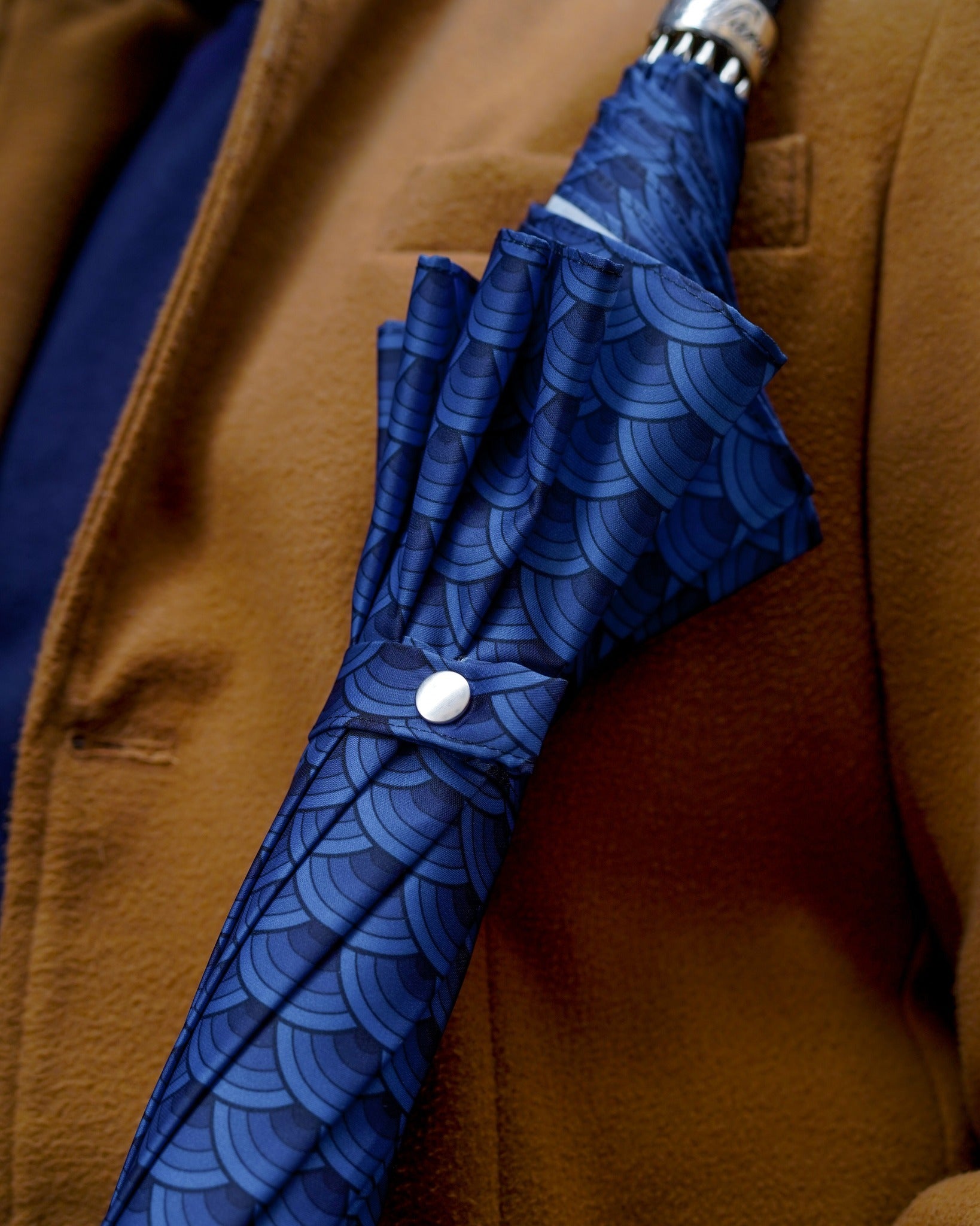 Men's premium umbrella with rock-style studded leather handle and durable carbon fiber ribs, stylish and sturdy for men.
