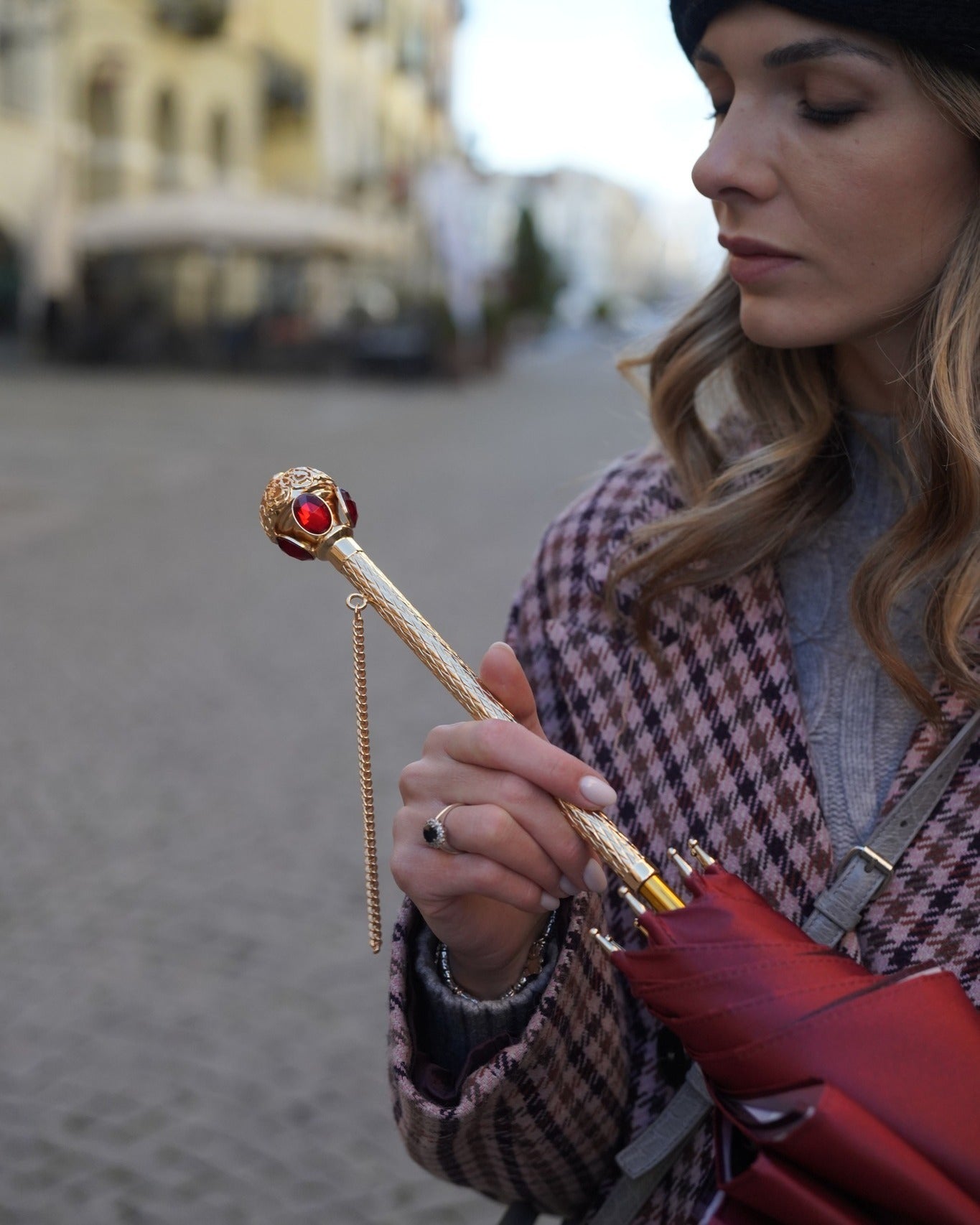 Luxury Burgundy Ilmarchesato rain umbrella with automatic opening, regal crown design, and red stone handle.