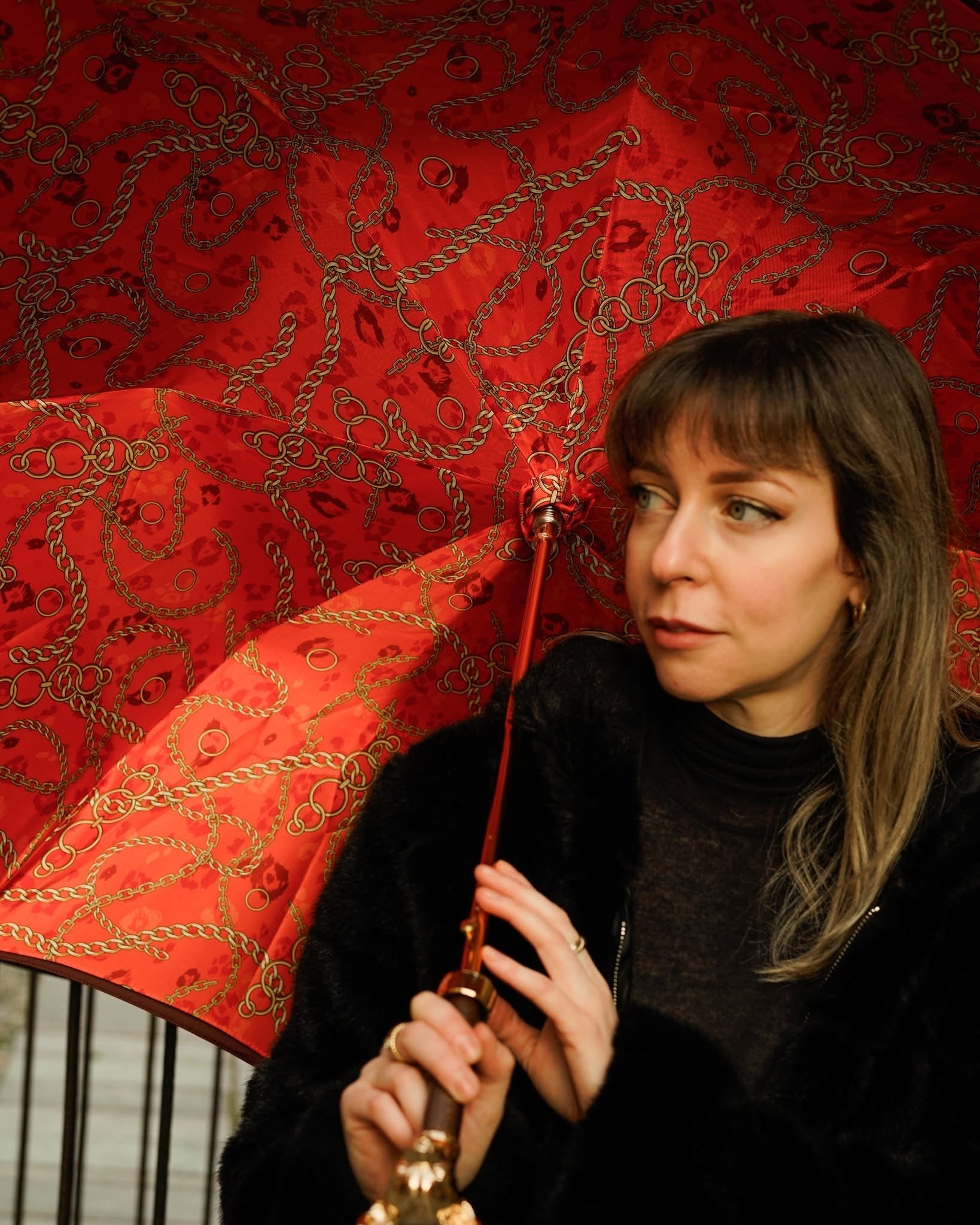 Red luxury Ilmarchesato rain umbrella with satin finish, gold Chihuahua handle, automatic opening, stylish and elegant design.