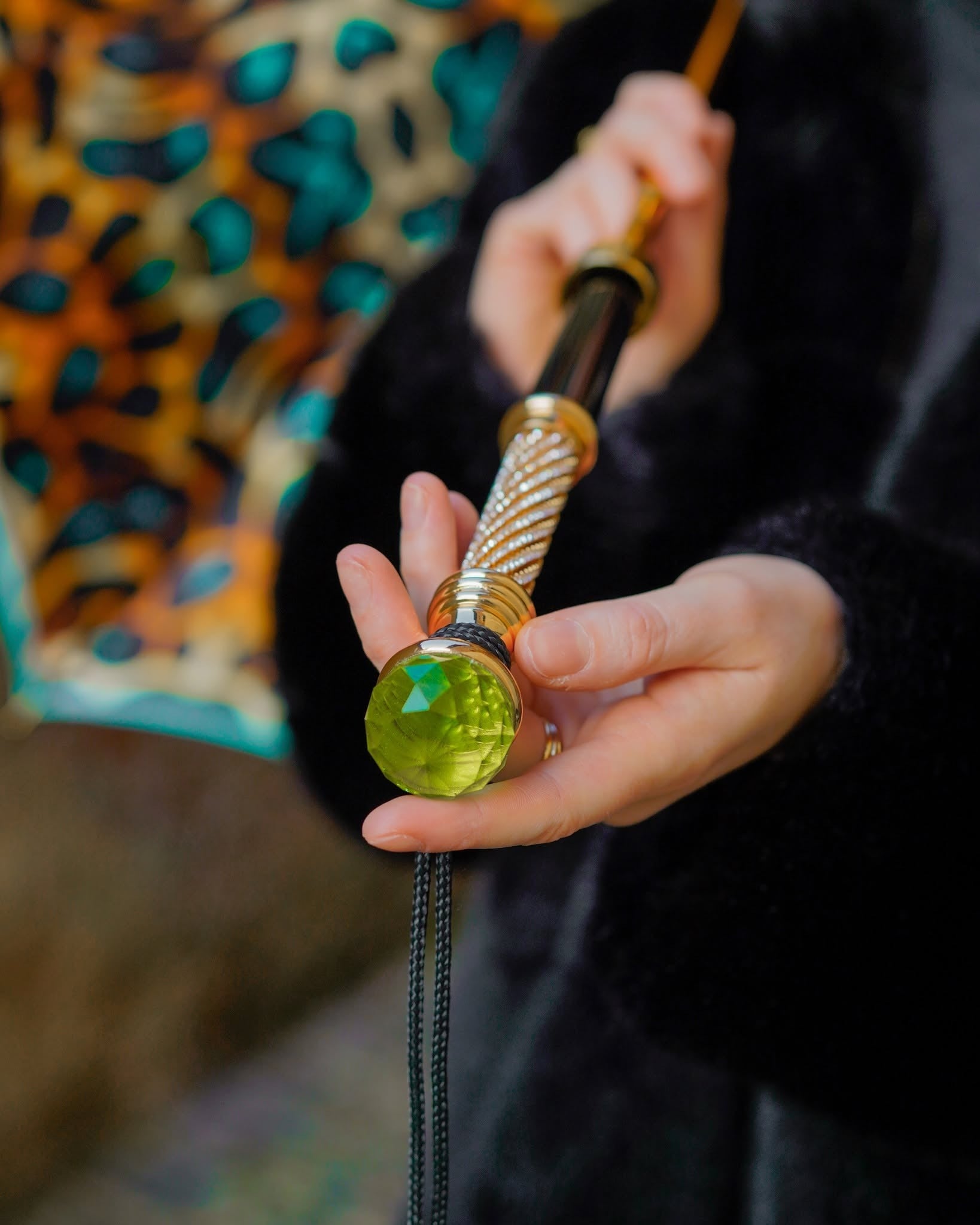 Luxury leopard rain umbrella by Ilmarchesato with automatic open, 24K gold handle, and green crystal accent.