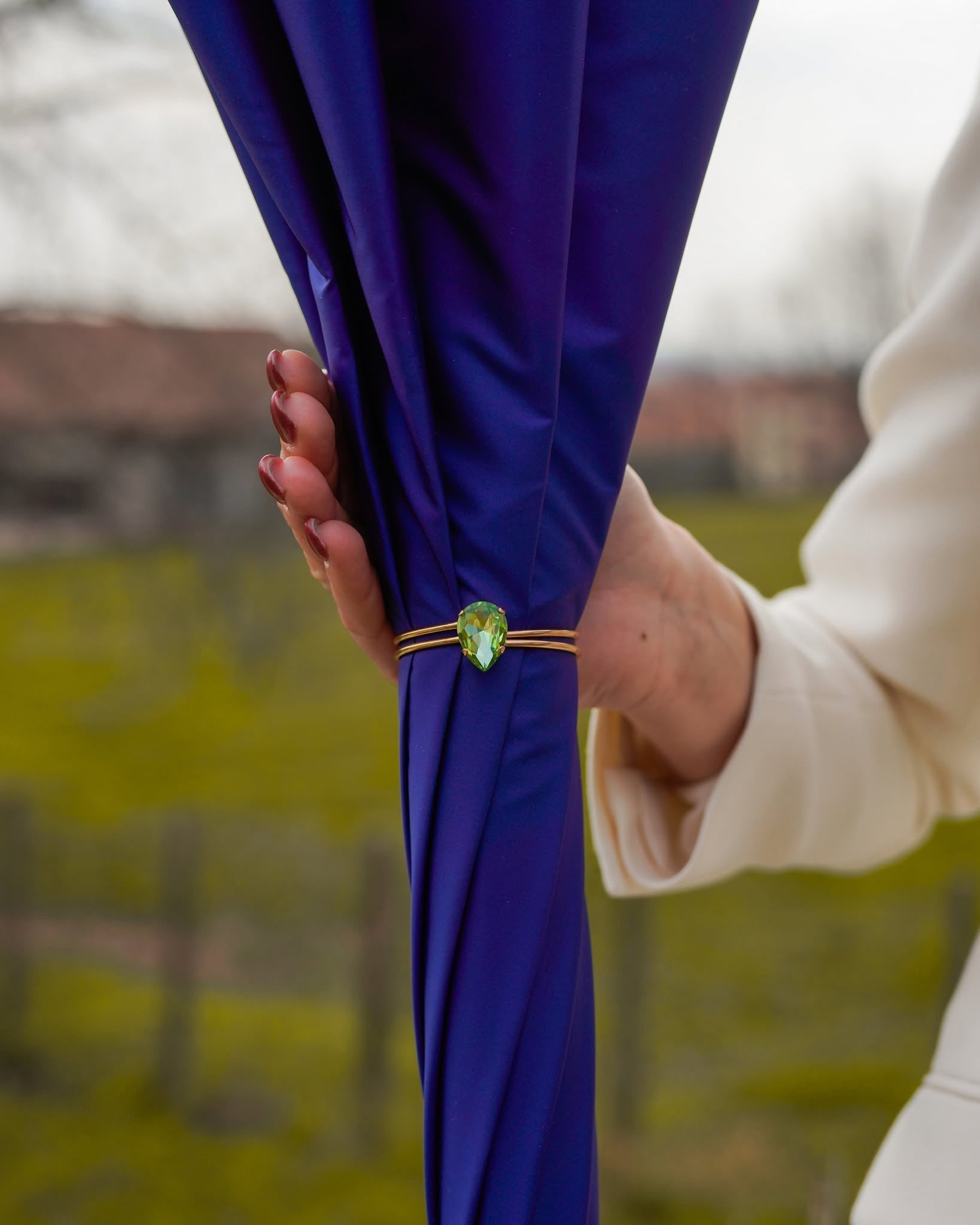 Handmade Italian Tree of Life rain umbrella by Ilmarchesato with gold-plated handle, featuring detailed tree design on fabric.