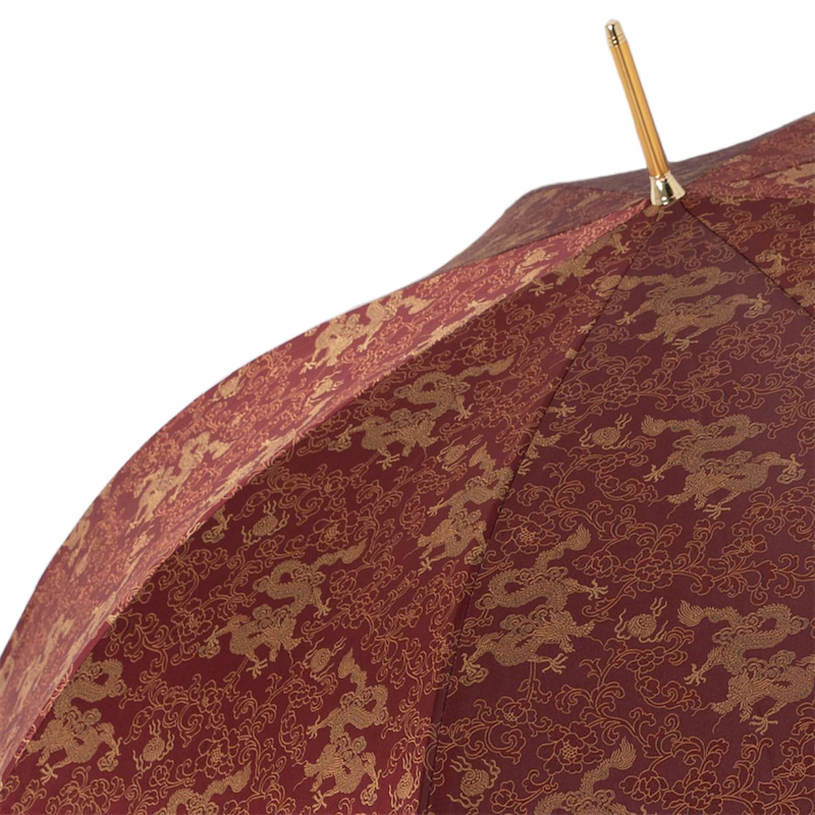 Luxury Pasotti burgundy umbrella showcasing golden dragon design and elegant Italian craftsmanship for men.