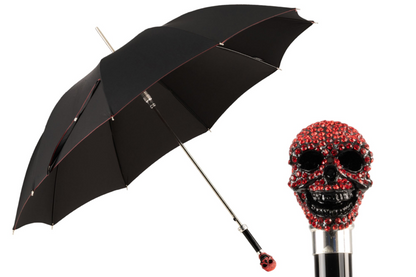 Luxury skull umbrella for men with Light Siam crystal handle by Ilmarchesato, featuring a dark canopy and ornate design.