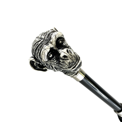 Men's artisan umbrella with hand-painted monkey handle by Ilmarchesato, featuring a classic canopy and detailed craftsmanship.