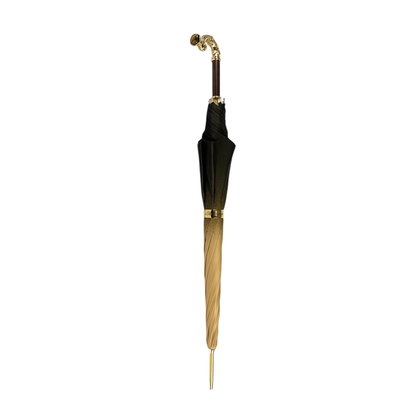 Gold-toned double-canopy umbrella with tiger eye handle by Ilmarchesato, showcasing elegant floral design and sturdy construction.