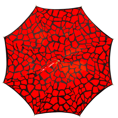 Black and red couture rain umbrella with gold filigree handle, featuring elegant design and sturdy canopy.