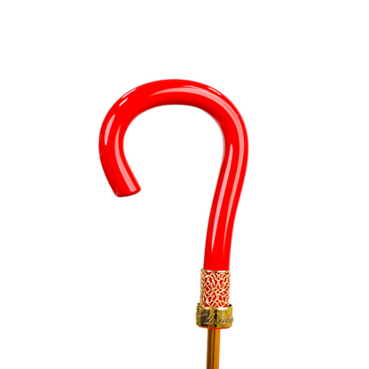 Black and red couture rain umbrella with gold filigree handle, featuring elegant fabric and intricate handle details.