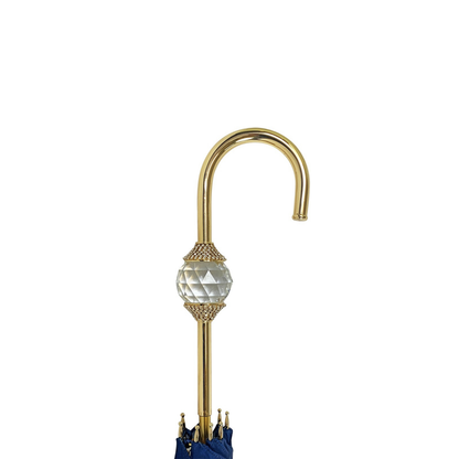 Navy blue luxury umbrella featuring a Swarovski crystal sphere handle by Ilmarchesato, open against a light background.