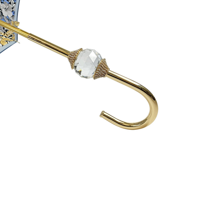 Navy blue luxury Ilmarchesato umbrella featuring a Swarovski crystal sphere handle, elegantly designed for rainy days.