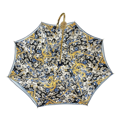 Navy blue luxury umbrella by Ilmarchesato featuring a Swarovski crystal sphere handle against a neutral background.