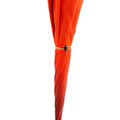 Orange floral umbrella by Ilmarchesato with a double canopy design, perfect for stylish rain protection for ladies.