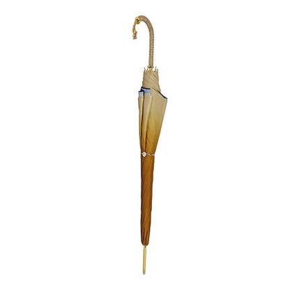 Luxury golden ladies umbrella by Ilmarchesato featuring an ornamental Arabic design against a white background.