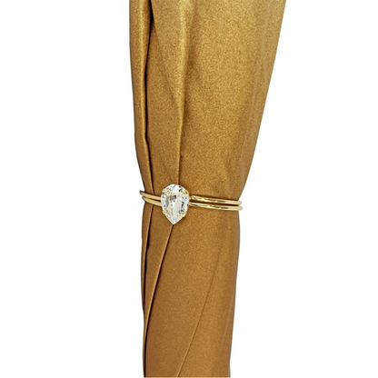 Luxury golden Ilmarchesato ladies umbrella featuring an ornamental Arabic design against a white background.