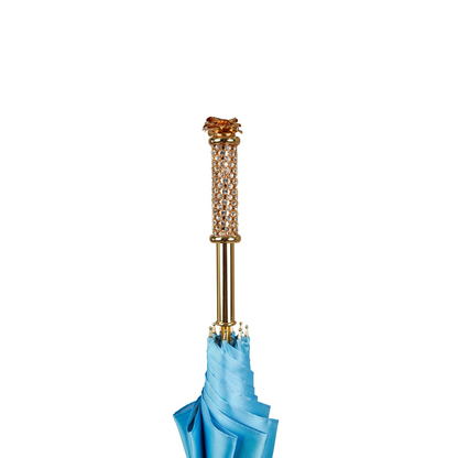 Royal Azure luxury umbrella by Ilmarchesato, showcasing intricate design and vibrant blue color against a neutral background.