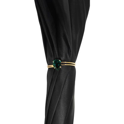 Luxury green double canopy umbrella with floral interior design by Ilmarchesato, open against a light background.
