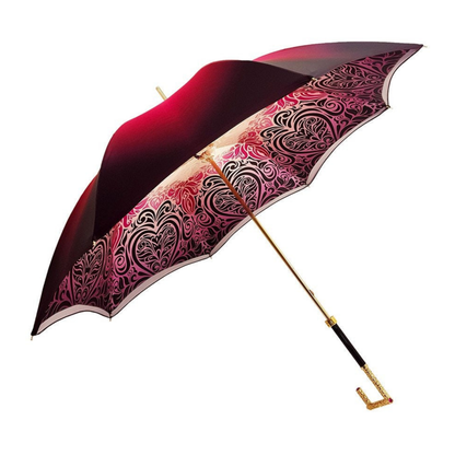 Luxury Ilmarchesato satin double canopy umbrella with a gradient design and elegant pearl handle, open against a backdrop.