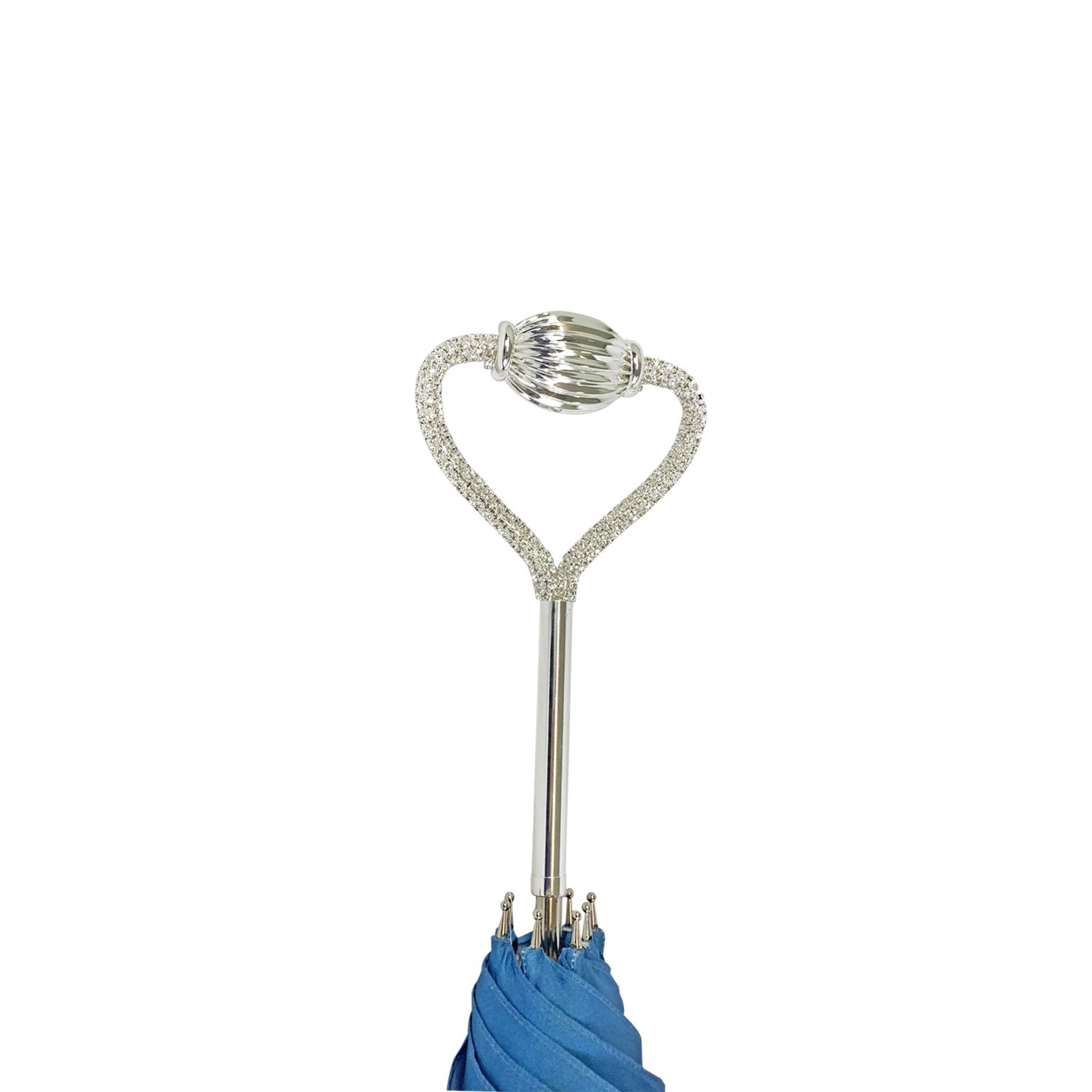 Light blue luxury umbrella by Ilmarchesato featuring abstract marine art design, open against a neutral background.