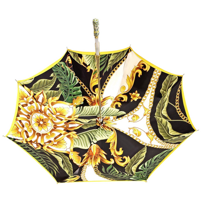 Yellow gold luxury umbrella by Ilmarchesato featuring a hand-enameled crystal handle, elegant design for rainy days.