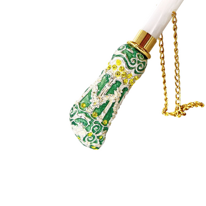 Yellow gold luxury umbrella with hand-enameled crystal handle, showcasing elegant design and premium craftsmanship.