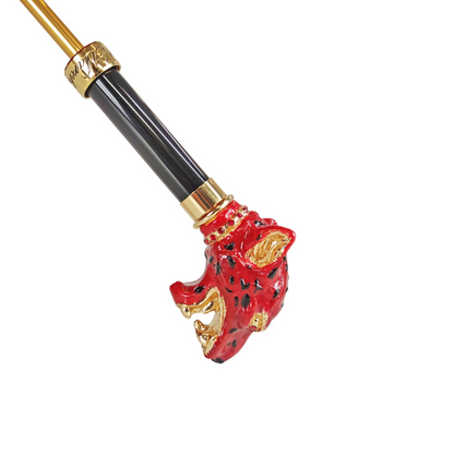 Red leopard print luxury umbrella by Ilmarchesato featuring a Swarovski crystal handle, perfect for rainy days.