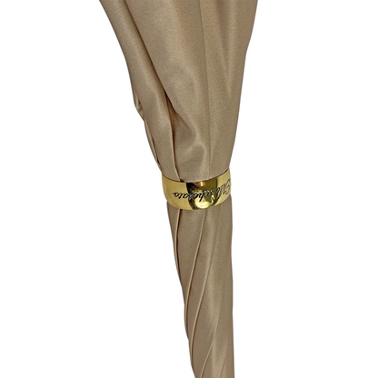 Animalier-inspired luxury rain umbrella by Ilmarchesato with a hand-enamelled dog handle and patterned canopy.