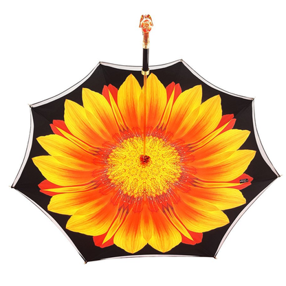 Dragonfly-inspired double canopy luxury umbrella for women by Ilmarchesato, featuring intricate designs and sturdy construction.