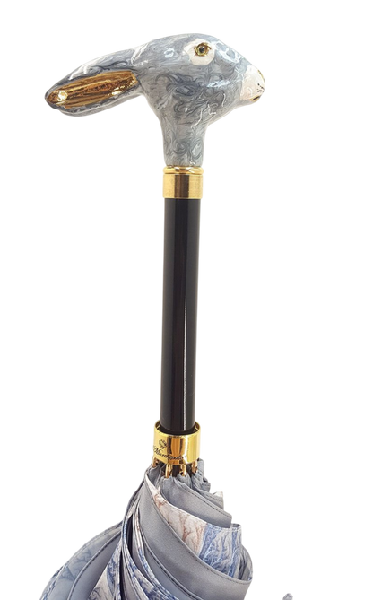 Elegant gradient grey Ilmarchesato rabbit umbrella displayed open, showcasing luxury design and sturdy construction.