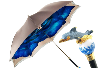 Dolphin-inspired double canopy umbrella with a blue rose interior design by Ilmarchesato, open against a light background.