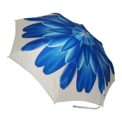 Blue Dahlia Ilmarchesato folding umbrella with 24K jeweled handle, showcasing elegant design and compact, portable rain protection.