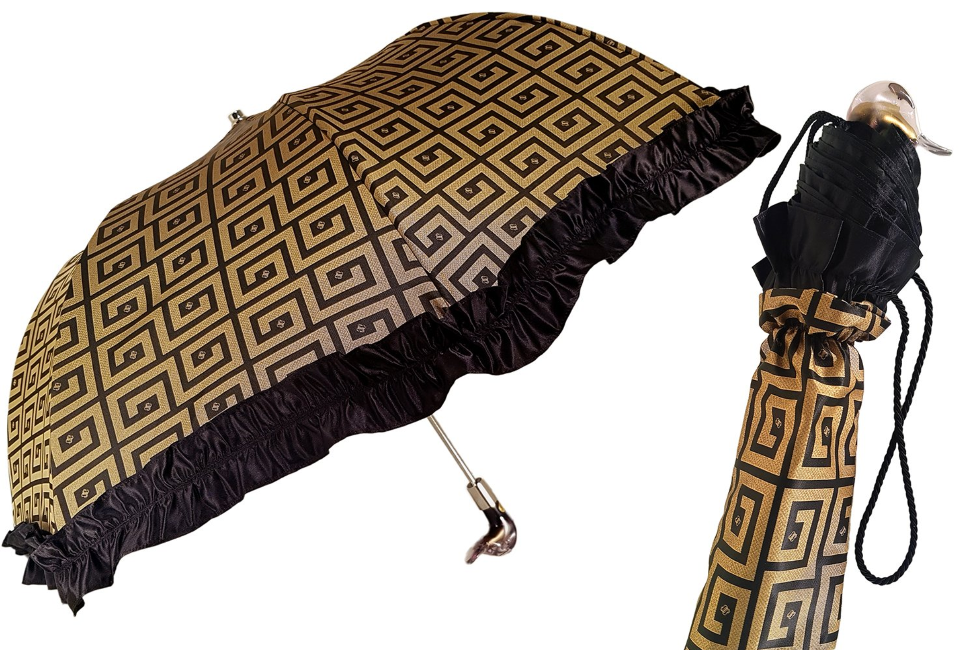 Automatic women’s folding umbrella with black ruffle and Greek design by Ilmarchesato, open showing intricate patterns and compact size.
